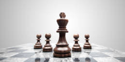 chessboard pieces illustrationg how to beat ploys during negotiation