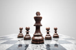 chessboard pieces illustrationg how to beat ploys during negotiation